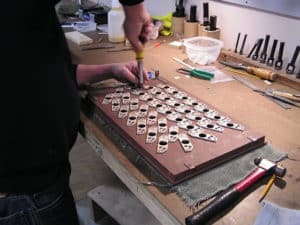 First steps for mounting new power knobs at Leek Pipe Organ Company, Berea, Ohio