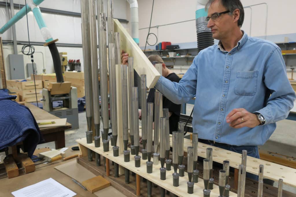 Organ builder, James Leek building clarinet wind chest at shop. Tonal addition for St. Stanislaus Church, Cleveland Ohio