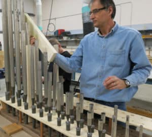 Organ builder, James Leek building clarinet wind chest at shop. Tonal addition for St. Stanislaus Church, Cleveland Ohio