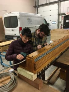 Kayla & Joseph Raville wiring a wind chest at Leek Pipe Organ Company, Berea, Ohio a labor of love by a loving couple