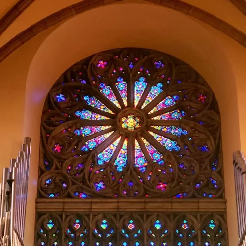 Stained glass rose window in Holy Trinity Lutherean Church, Akron Ohio